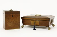 Lot 207 - A Regency walnut (?) sewing box on brass ball and claw feet