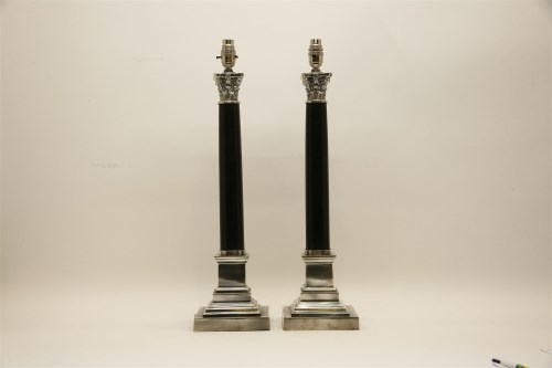 Lot 312 - A pair of silver plated and black granite Corinthian column table lamps
