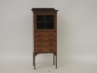 Lot 515A - An Edwardian inlaid mahogany music cabinet