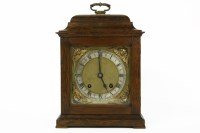 Lot 296 - An early 20th oak cased table clock