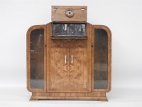 Lot 583 - An Art Deco burr walnut cocktail cabinet/display cabinet