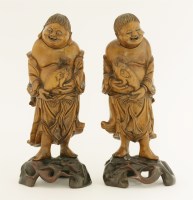 Lot 223 - A pair of Chinese boxwood figures