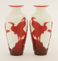 Lot 213 - A pair of Chinese overlay Peking glass vases