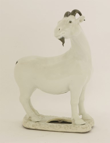 Lot 121 - A Chinese porcelain figure