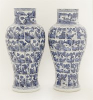 Lot 29 - A pair of Chinese porcelain blue and white vases