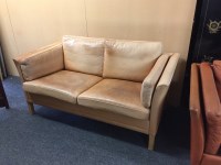 Lot 427 - A Danish light brown leather settee