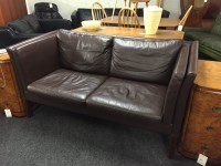 Lot 428 - A Danish two seater dark brown settee