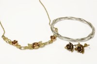 Lot 32 - A 9ct gold necklace with two colour gold rose centrepiece
