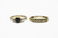 Lot 12 - A gold seven stone diamond ring marked 375