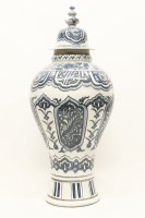 Lot 374 - A Persian baluster jar and cover