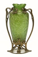 Lot 235 - An Art Nouveau green glass vase
