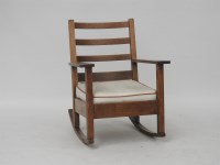 Lot 463 - An oak Liberty style rocking chair