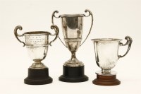 Lot 139 - Two silver trophies and a christening mug