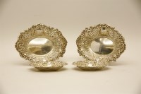 Lot 133 - A group of four silver bonbon dishes
one pair shaped and pierced oval