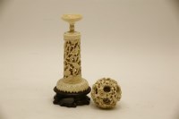 Lot 191 - A 19th century Chinese carved ivory puzzle ball on stand