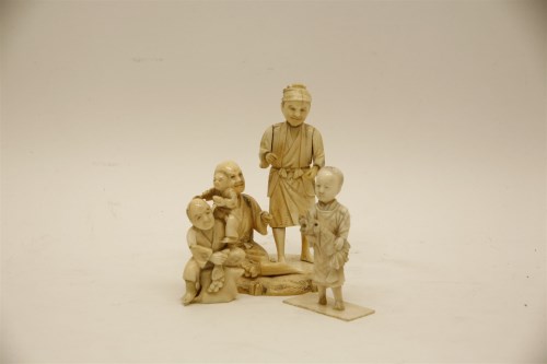 Lot 174 - Three Meiji period Japanese ivory figures c.1900