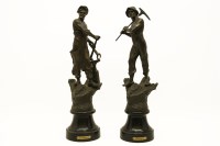 Lot 215 - A pair of spelter figures of agricultural workers
