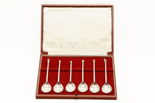 Lot 91 - A cased set of six spoons with ornate tops