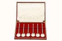 Lot 91 - A cased set of six spoons with ornate tops