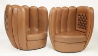 Lot 609 - A pair of contemporary baseball glove chairs