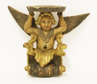 Lot 97 - A carved gilt and polychrome decorated wall bracket