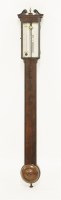 Lot 424 - A George lll mahogany stick barometer