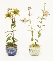 Lot 107 - Two miniature models of lilies in jardinières