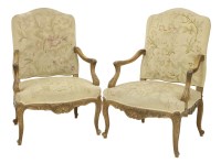 Lot 431 - A pair of Louis XV-style carved fauteuils