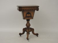 Lot 534 - A Victorian rosewood sewing table