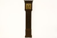 Lot 563 - An 18th century carved oak longcase clock