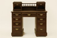 Lot 581 - An Edwardian walnut twin pedestal desk