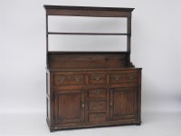 Lot 607 - An 18th century oak dresser