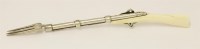Lot 427 - An 18th century silver and ivory fork in the form of rifle