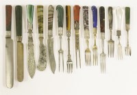 Lot 446 - An associated group of five knives and eight forks