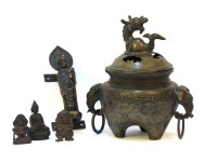 Lot 139 - A Chinese Bronze censer with mythical beast knop together with four Buddha figures