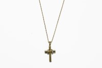 Lot 36 - A 9ct gold diamond set cross on Prince of Wales chain