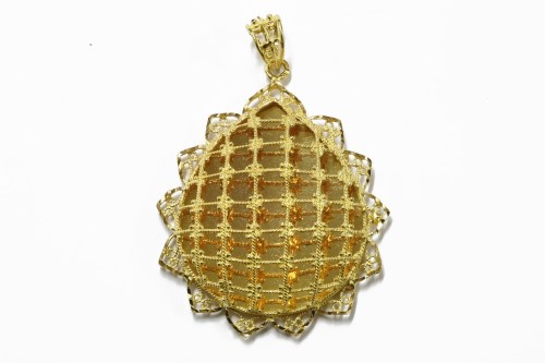 Lot 16 - A high carat gold pear shaped pendant