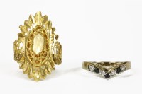 Lot 5 - A high carat gold diamond cut lozenge shaped ring