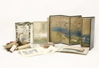 Lot 232 - An album containing nineteen Japanese wood block prints and watercolours