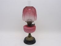 Lot 366 - A Victorian brass oil lamp with enamel sunburst levers