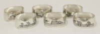 Lot 545 - A set of six Iraqi silver napkin rings