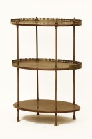 Lot 447 - A three tier oval etagere