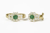 Lot 14 - A gold emerald and cubic zirconia cluster ring