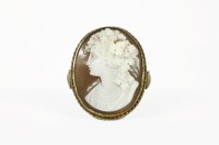 Lot 17 - A gold shell cameo ring of a young maiden (tested as approximately 18ct)
8.84g