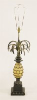 Lot 587 - A painted wooden table lamp