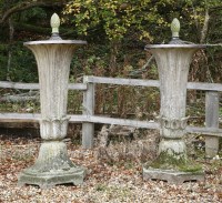 Lot 543 - A pair of composition stone ornaments