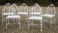 Lot 592 - A set of six painted iron garden chairs