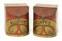 Lot 112 - A pair of red toleware spice boxes