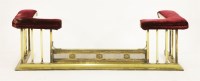 Lot 540 - An Edwardian brass club fender