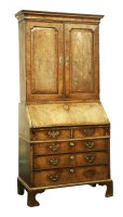 Lot 595 - A George II walnut bureau bookcase